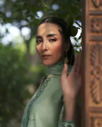 Bold Creative Direction Style – Amnah Sikandar Design Studio Editorial fashion photography showcasing a bold creative direction style with high-impact wardrobe and artistic framing. - Carousel Frame 3