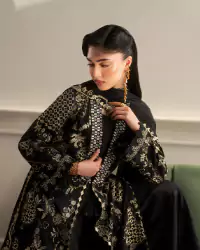 Moody Artistic Model Shots – Amnah Sikandar Design Studio Moody and artistic fashion photography featuring a professional model with dramatic shadows and creative lighting design. - Carousel Frame 9
